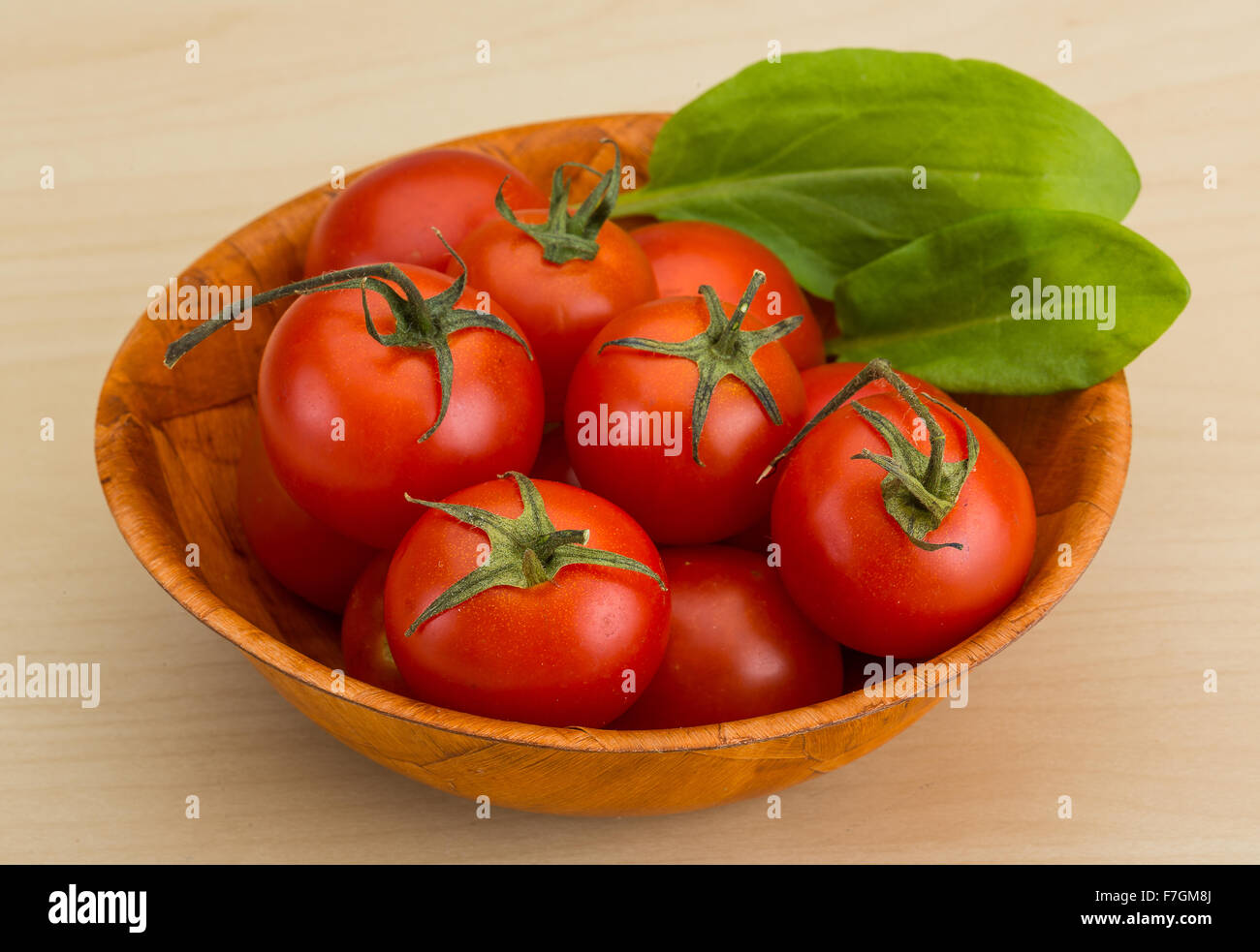 Fresh ripe Cherry tomatoes in the basket Stock Photo - Alamy