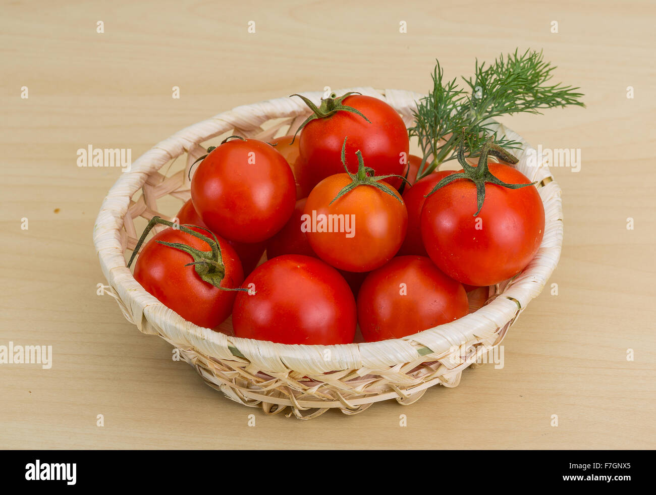 Fresh ripe Cherry tomatoes in the basket Stock Photo - Alamy