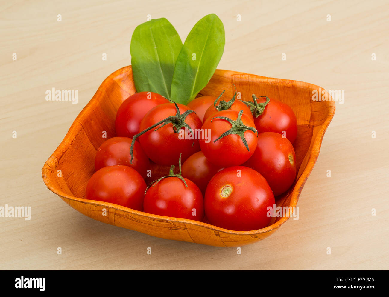 Fresh ripe Cherry tomatoes in the basket Stock Photo - Alamy
