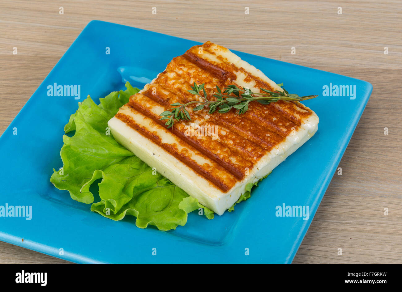 Deep Fried cheese with thyme and salad Stock Photo