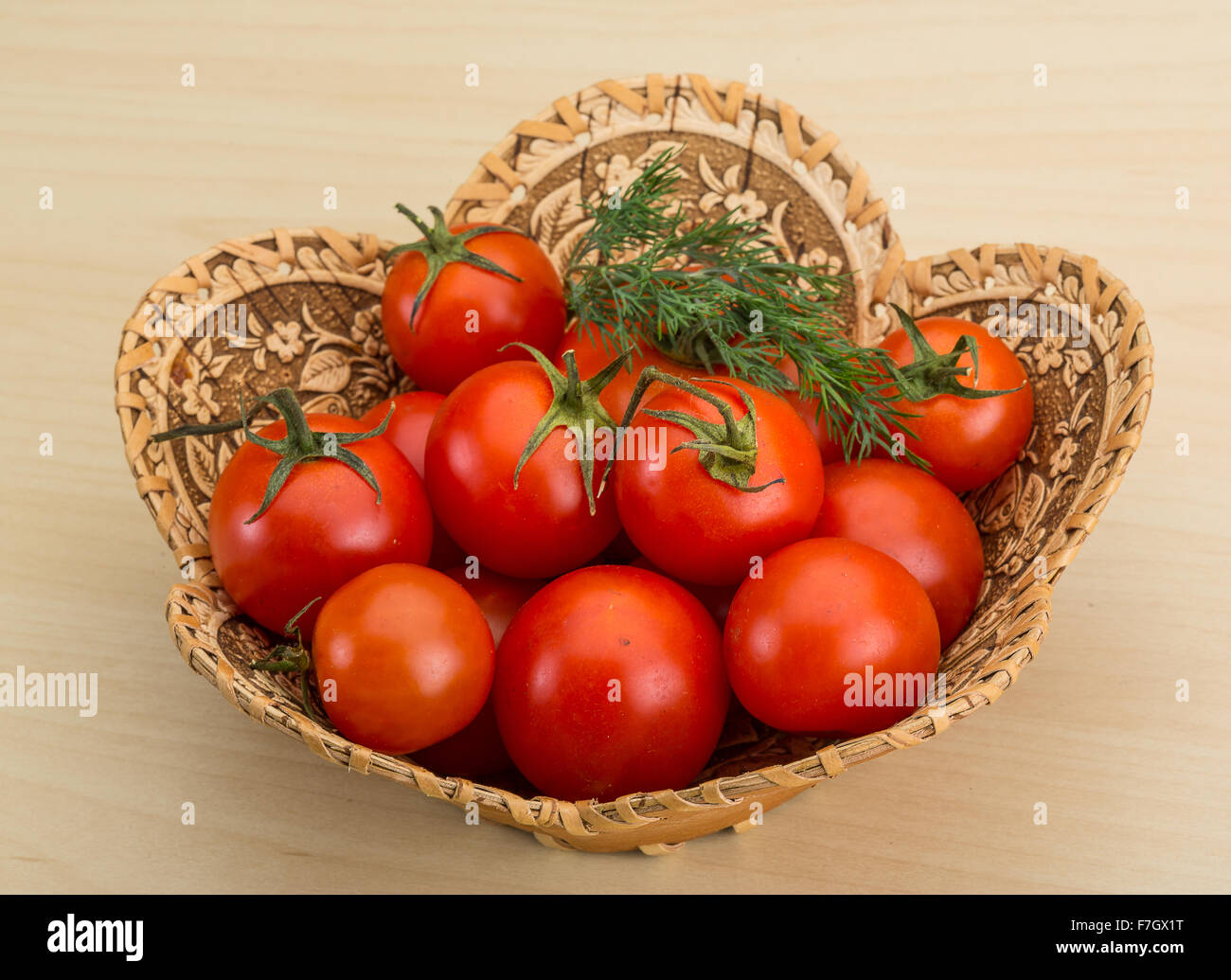 Fresh ripe Cherry tomatoes in the basket Stock Photo - Alamy