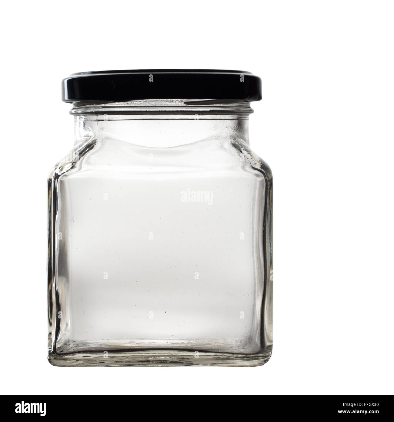 Glass jar, black lid. Isolated on white Stock Photo Alamy