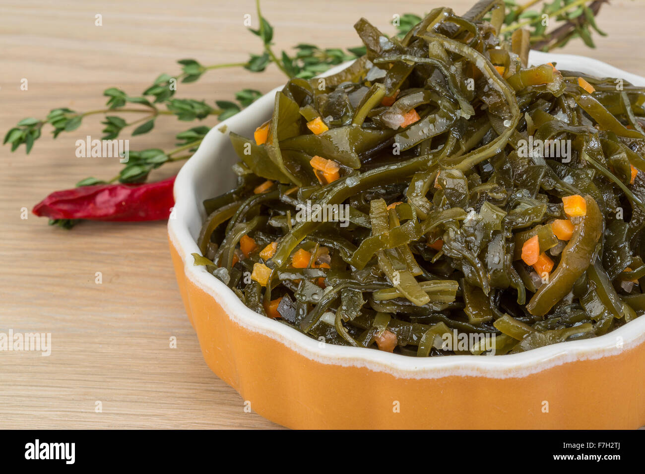 Marinated Laminaria salad in the bowl with spices Stock Photo - Alamy