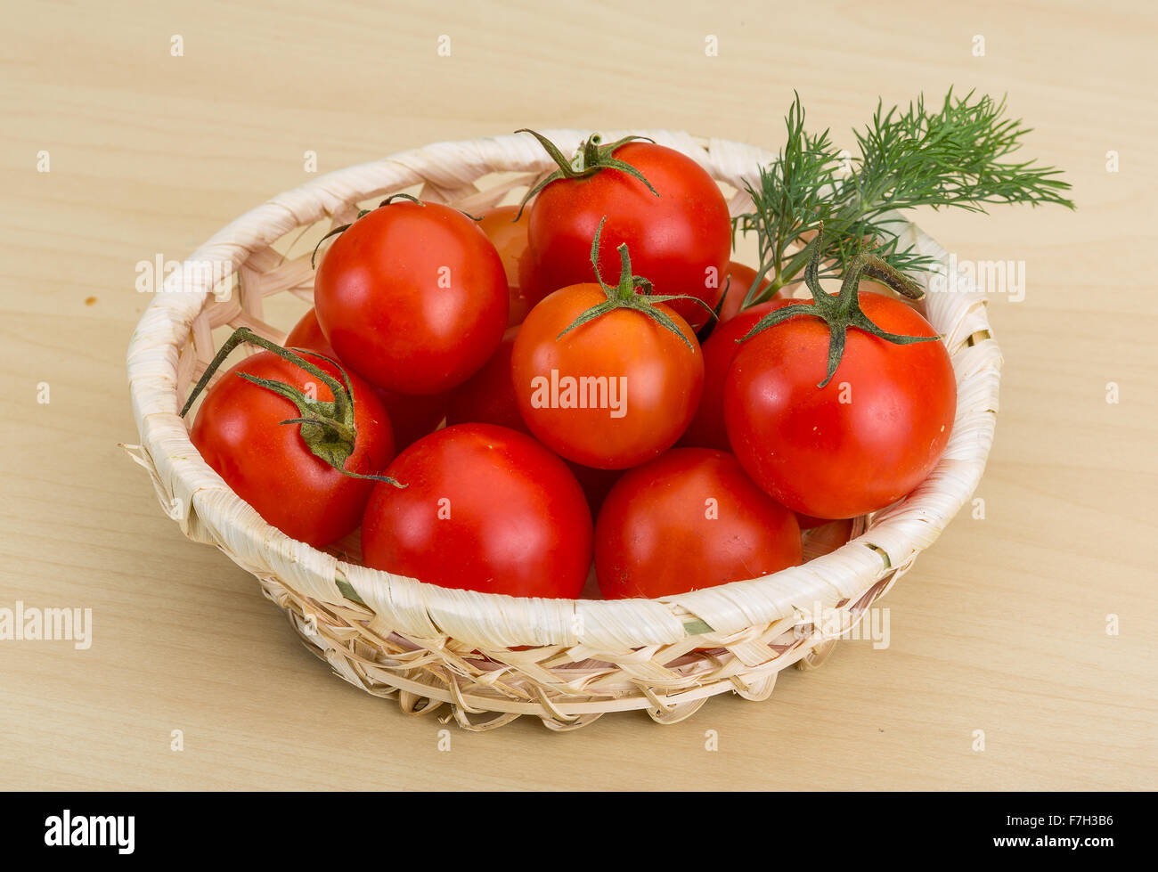 Fresh ripe Cherry tomatoes in the basket Stock Photo - Alamy