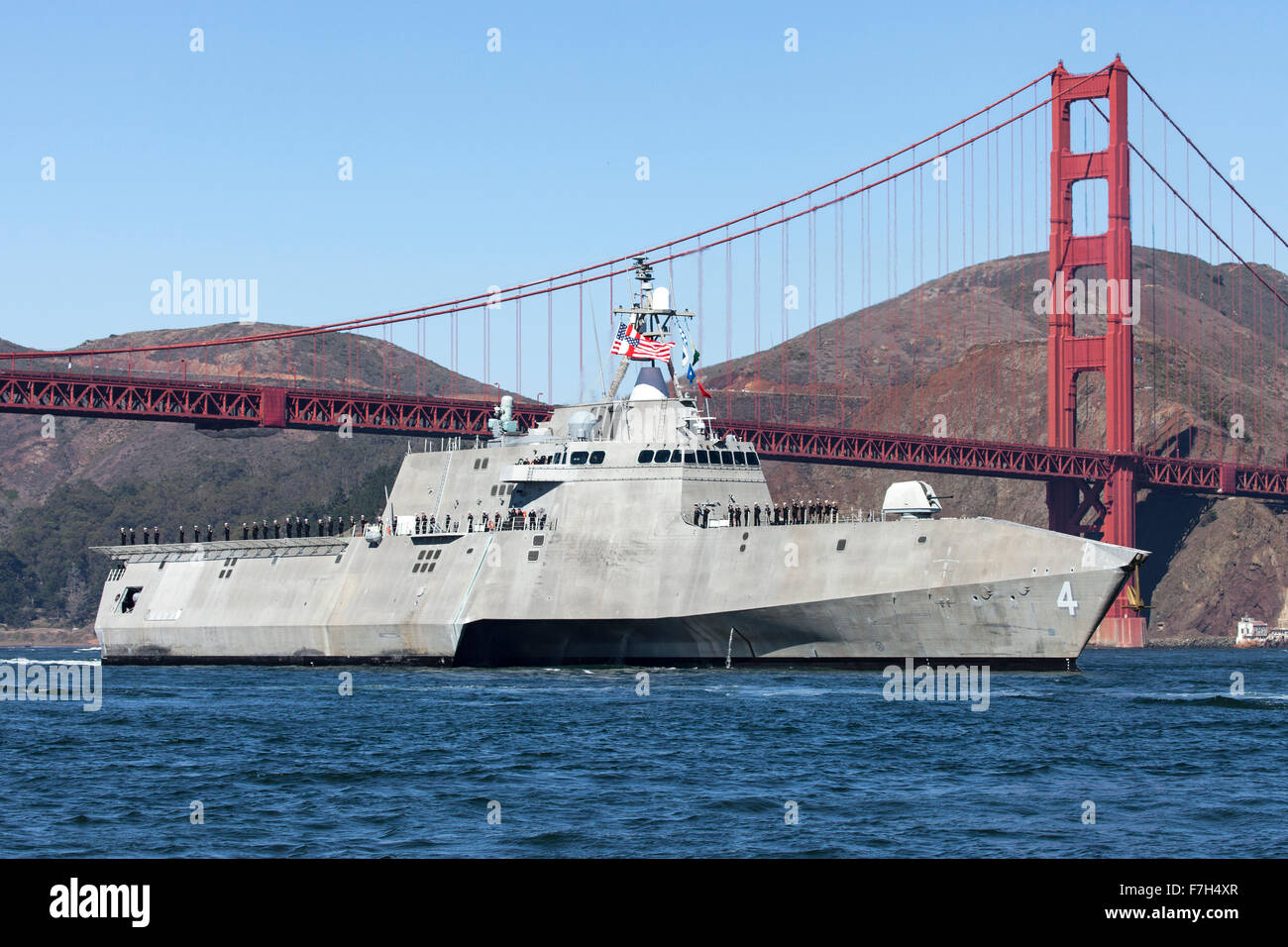 The Independence-class littoral combat ship USS Coronado (LCS-4) passes under the Golden Gate Bridge as it enters San Francisco Stock Photo