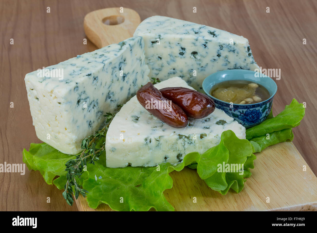 Blue cheese with rosemary, honey and data Stock Photo Alamy