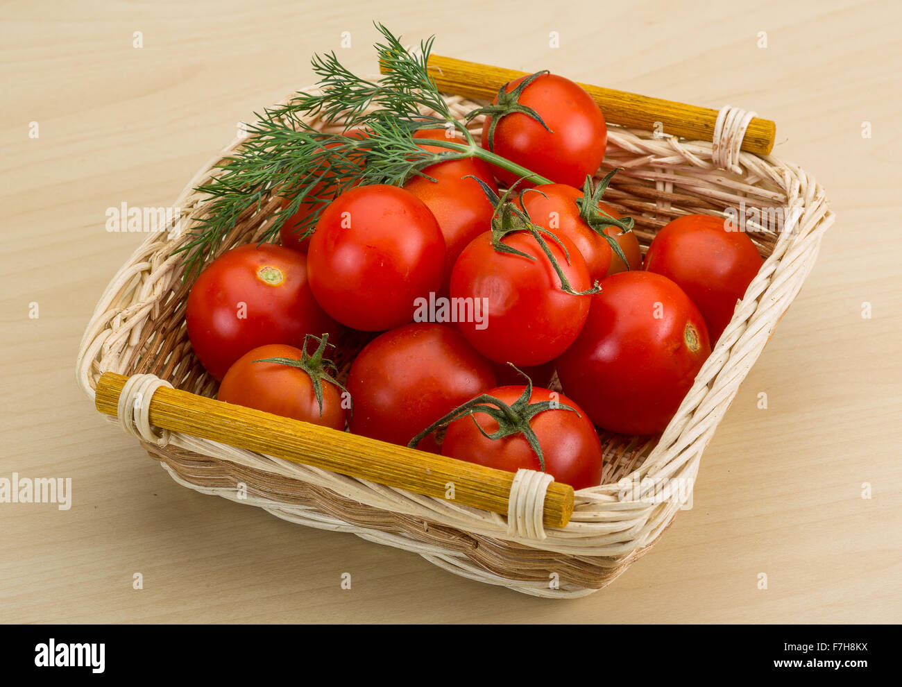 Fresh ripe Cherry tomatoes in the basket Stock Photo - Alamy
