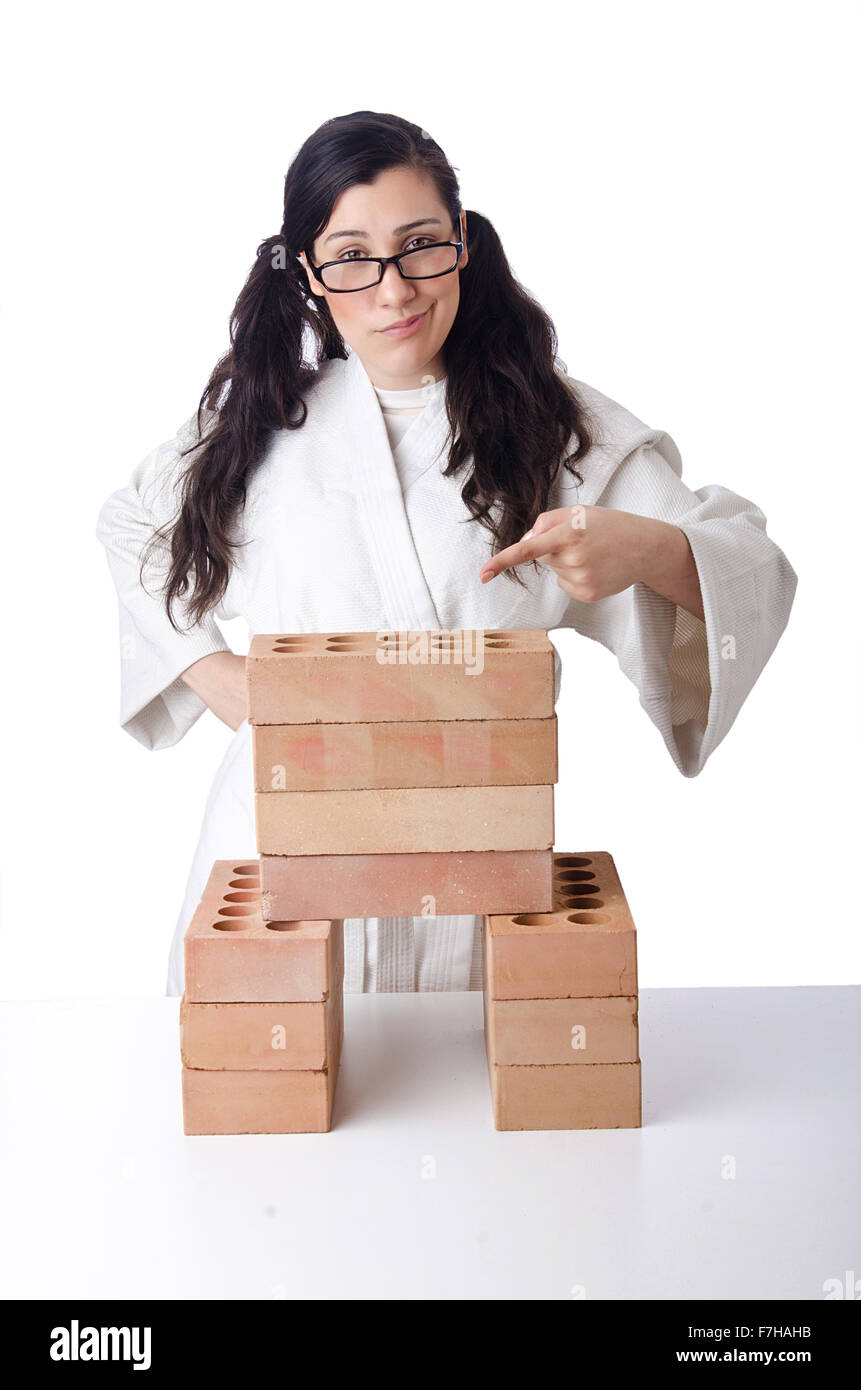 Woman karate breaking bricks on white Stock Photo Alamy