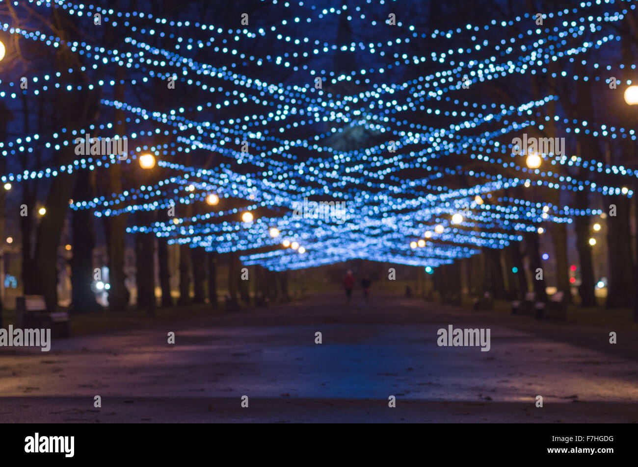 Blurred image of New Year and Christmas lighting decoration of city boulevard Stock Photo