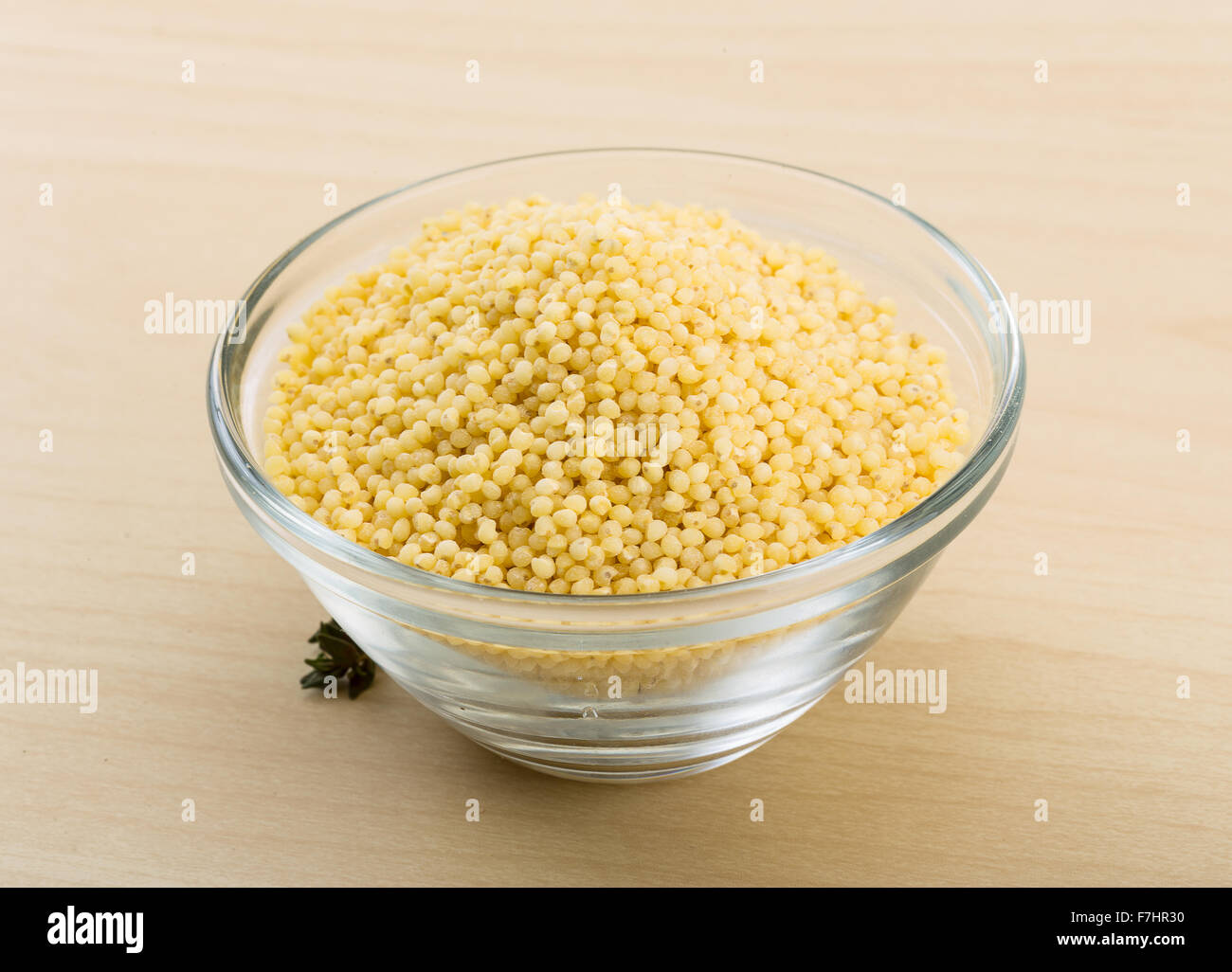 Dry couscous pile on the glass bowl Stock Photo Alamy