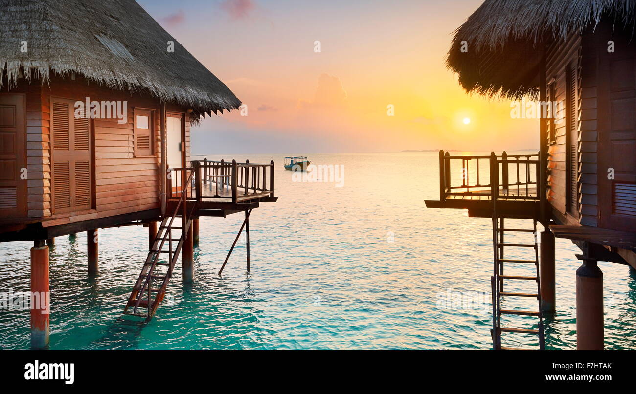 Tropical sunset scenery at Maldives Islands Stock Photo