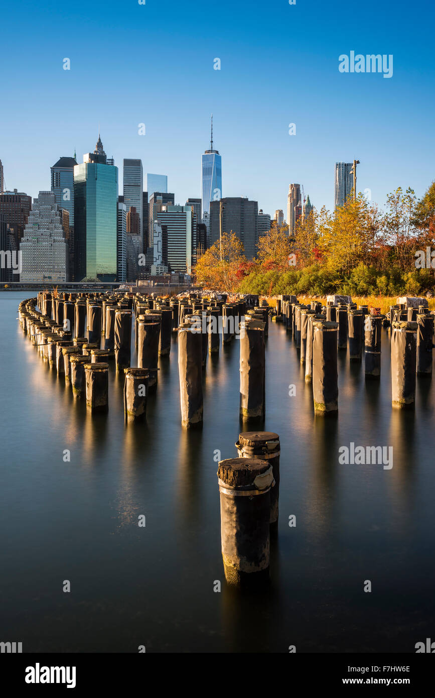Lower Manhattan skyline at sunset from Brooklyn Bridge Park, Brooklyn, New York, USA Stock Photo