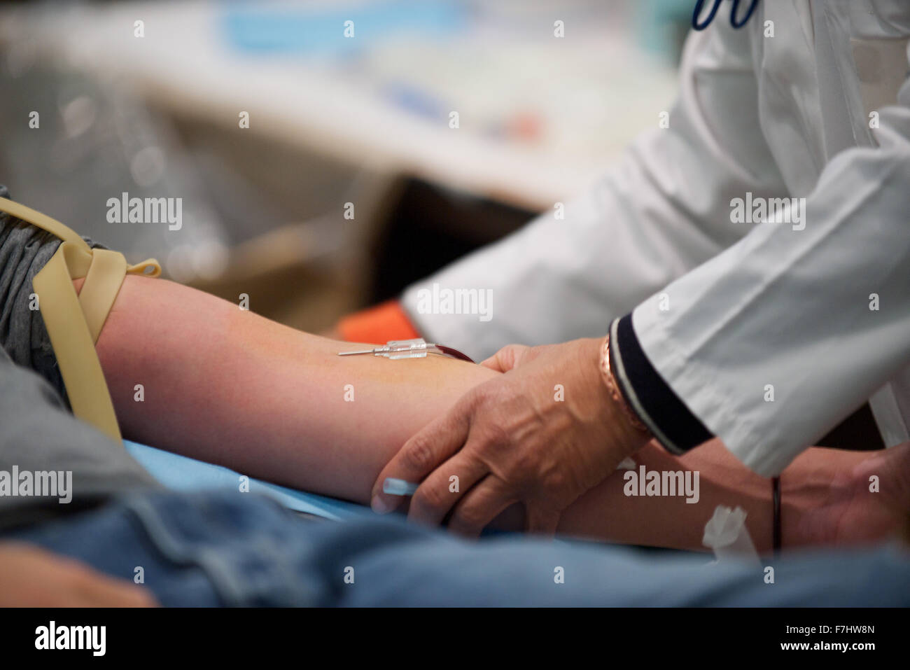 Person giving blood, close-up Stock Photo