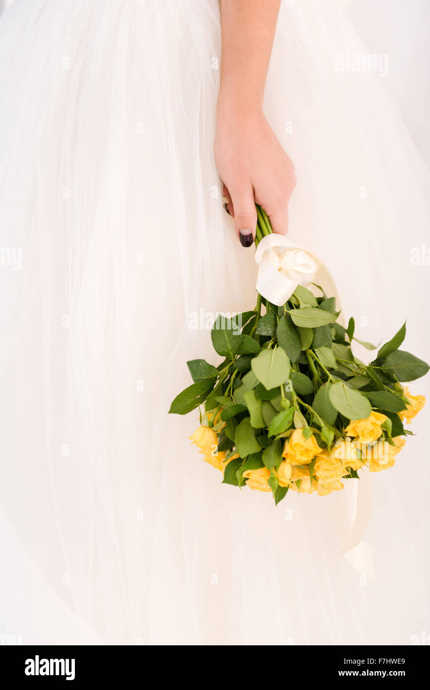 Closeup portrait bride holding wedding flowers Stock Photo Alamy