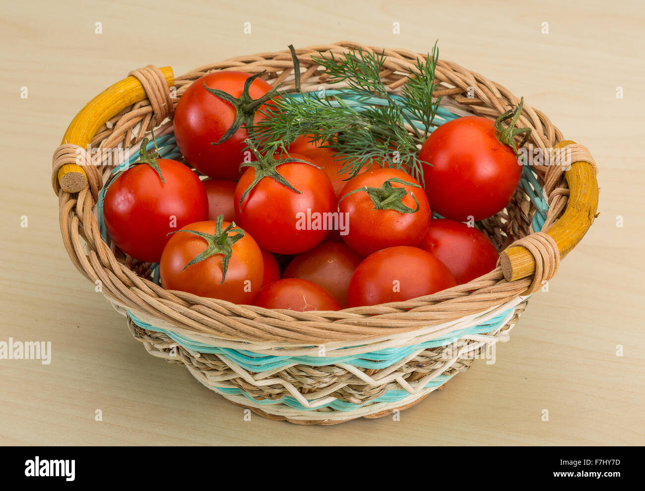 Fresh ripe Cherry tomatoes in the basket Stock Photo - Alamy