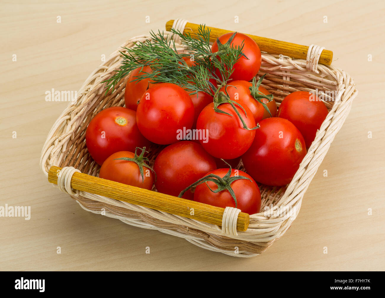 Fresh ripe Cherry tomatoes in the basket Stock Photo - Alamy
