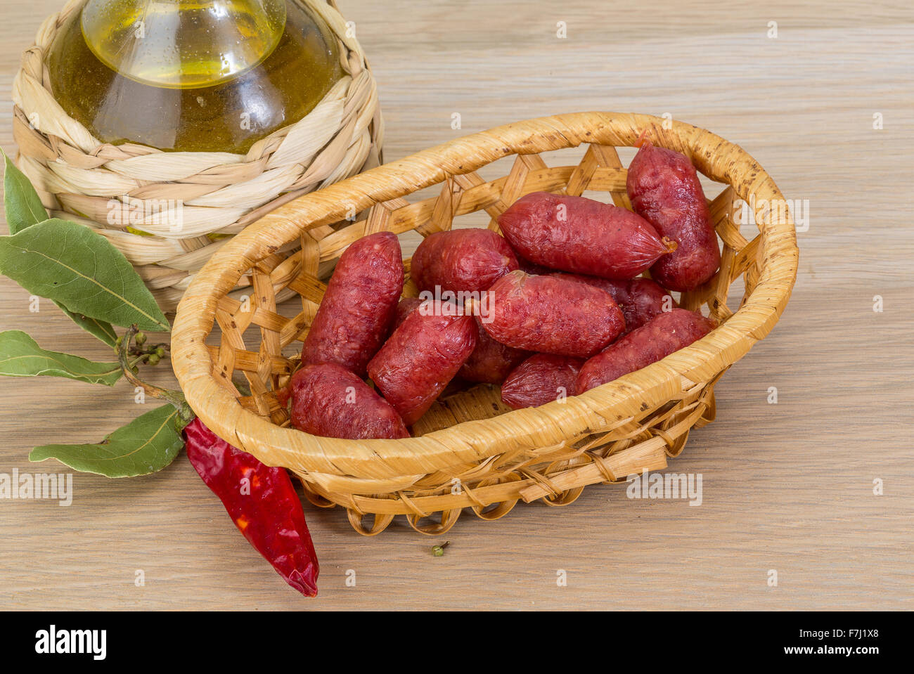 Mini salami sausage on the wood background Stock Photo Alamy