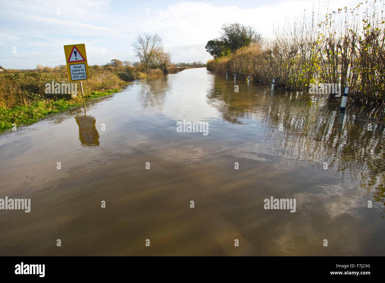 Letton, Herefordshire, UK. 1st December, 2015. UK Weather: Flooded road at Letton Herefordshire with surrounded farmland flooded by the River Wye after it burst it's banks. Credit: Jeff Morgan/Alamy Live News Stock Photo