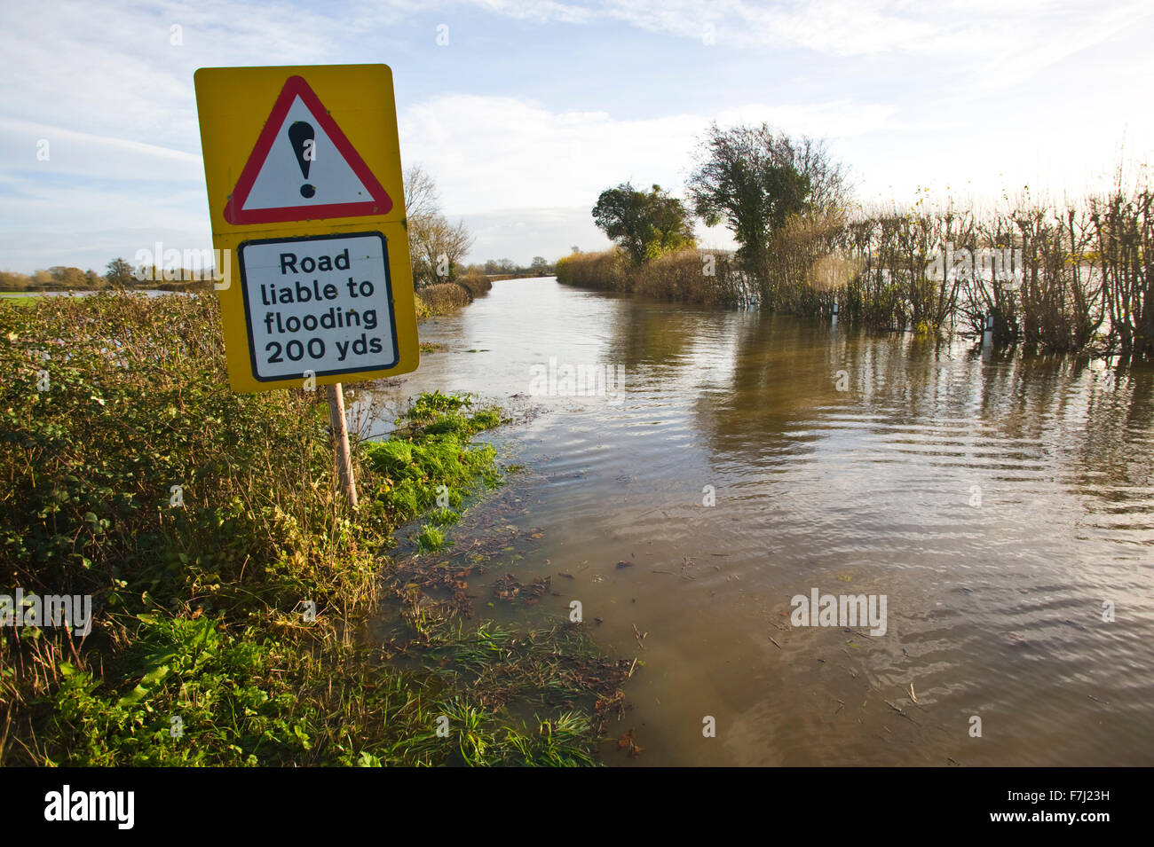 Letton, Herefordshire, UK. 1st December, 2015. UK Weather: Flooded road at Letton Herefordshire with surrounded farmland flooded by the River Wye after it burst it's banks. Credit: Jeff Morgan/Alamy Live News Stock Photo