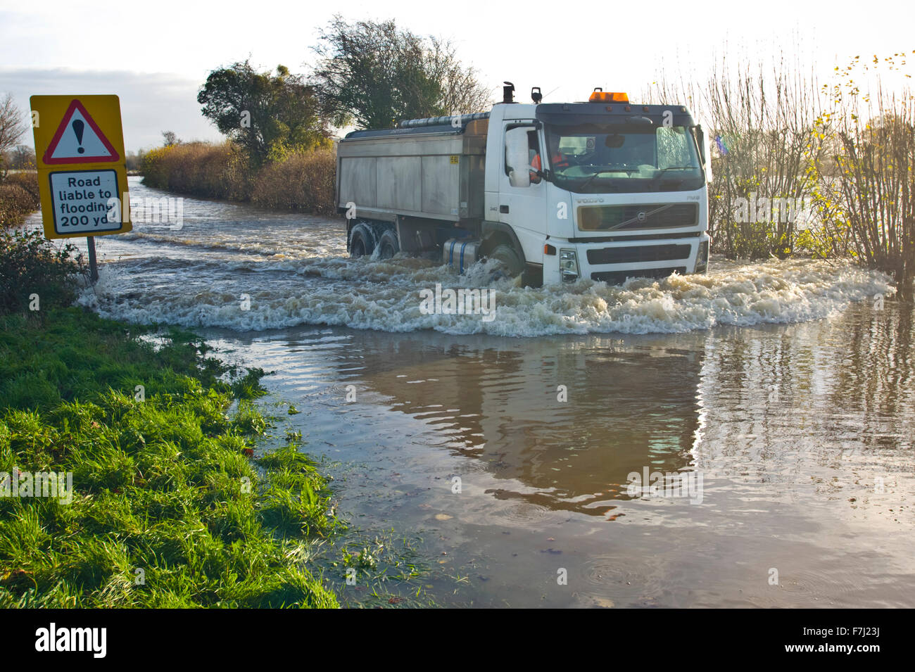 Letton, Herefordshire, UK. 1st December, 2015. UK Weather: Flooded road at Letton Herefordshire with surrounded farmland flooded by the River Wye after it burst it's banks. Credit: Jeff Morgan/Alamy Live News Stock Photo