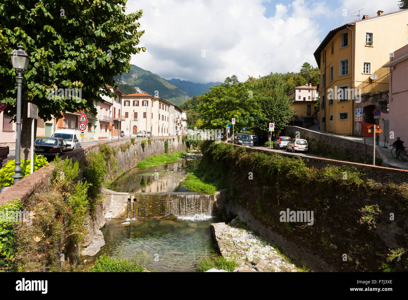 Fiume Versilia river flows through Seravezza, Tuscany Stock Photo
