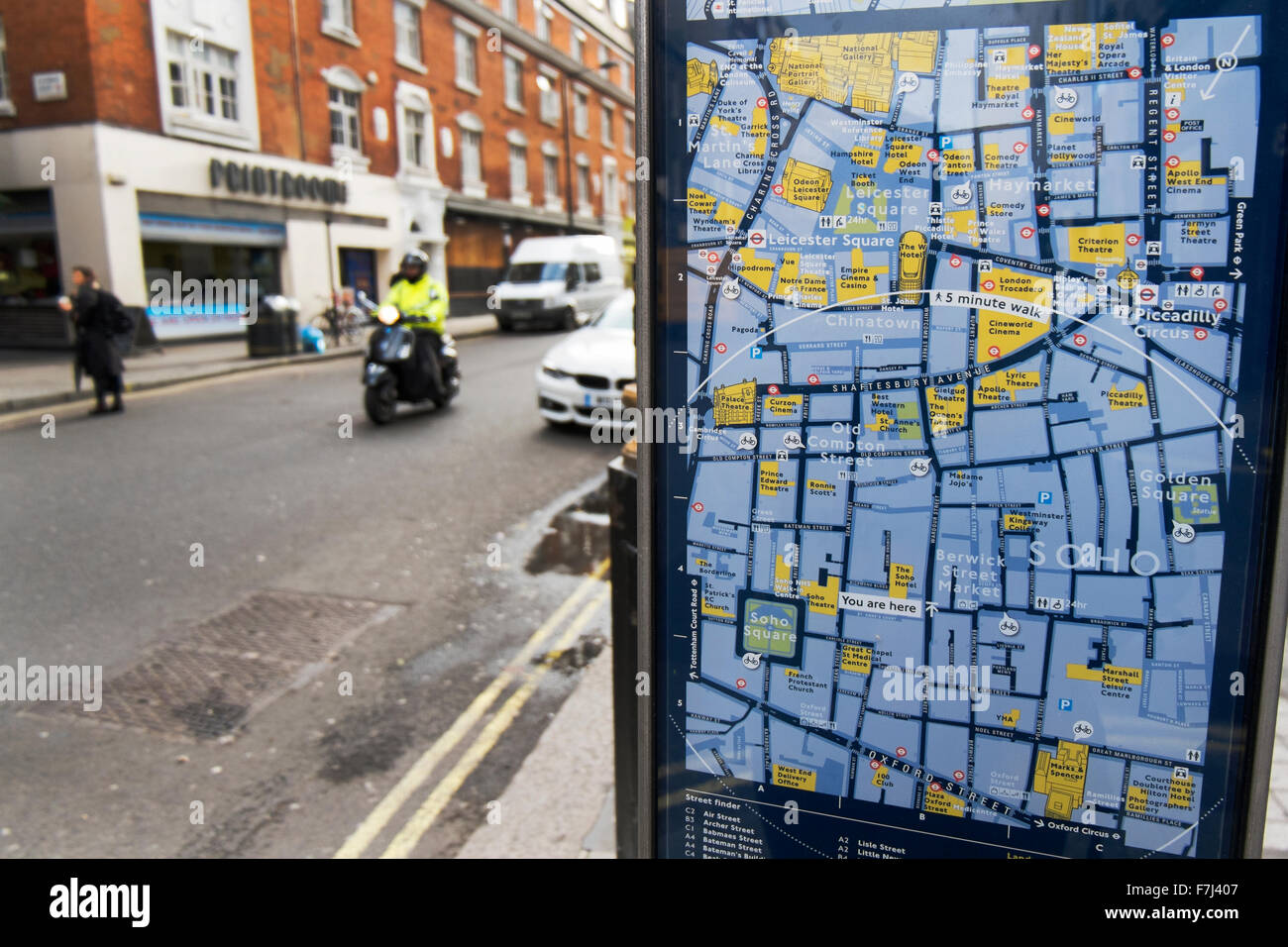 Street sign showing a map of where you are at Wardour Street and