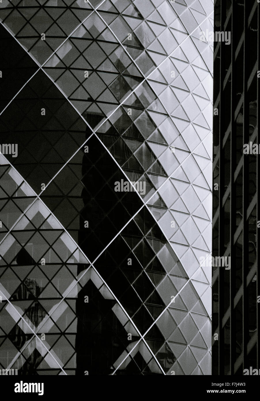 The Gherkin or 30 St Saint Mary Axe in City Of London in England in Great Britain in the United Kingdom UK. Modern Architecture Building Buildings Stock Photo