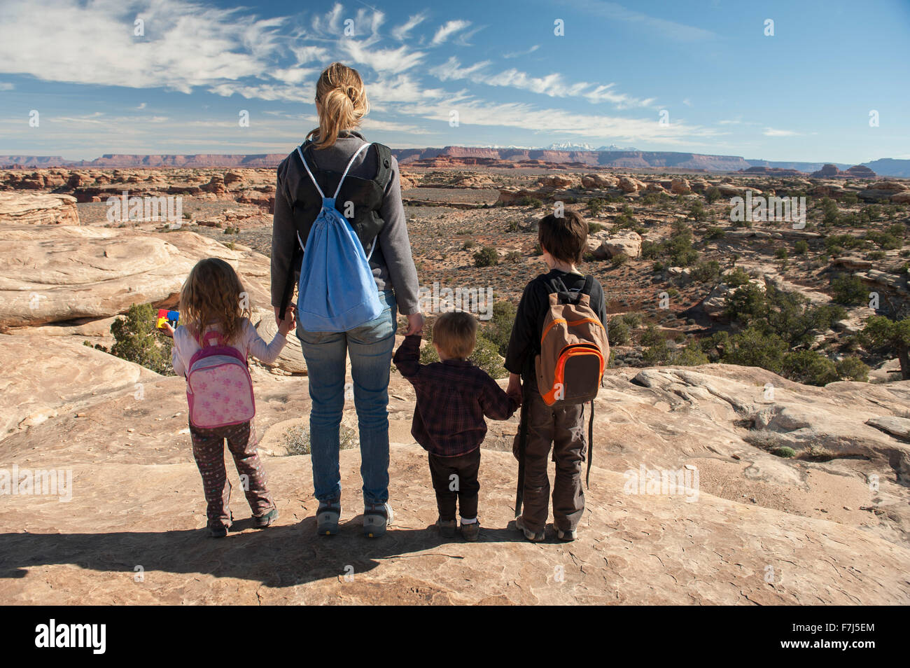 Family looking at scenic view in Canyonlands National Park, Utah, USA Stock Photo