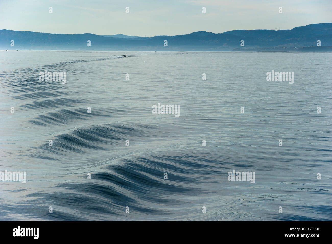 Wake Ripples Rippled wake on water Stock Photo - Alamy