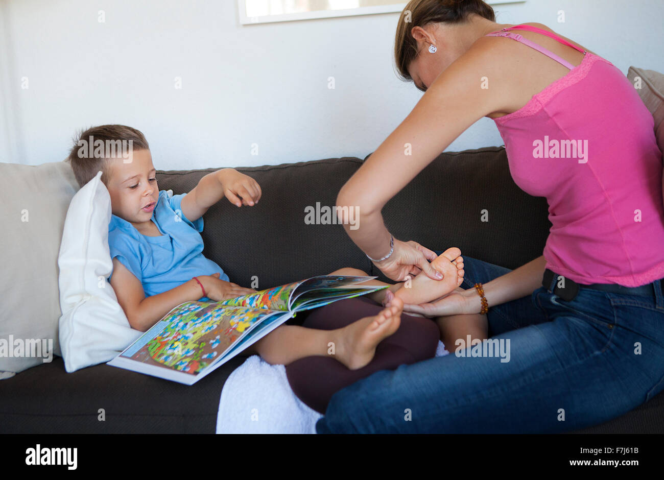 Foot massage boy hi-res stock photography and images - Alamy