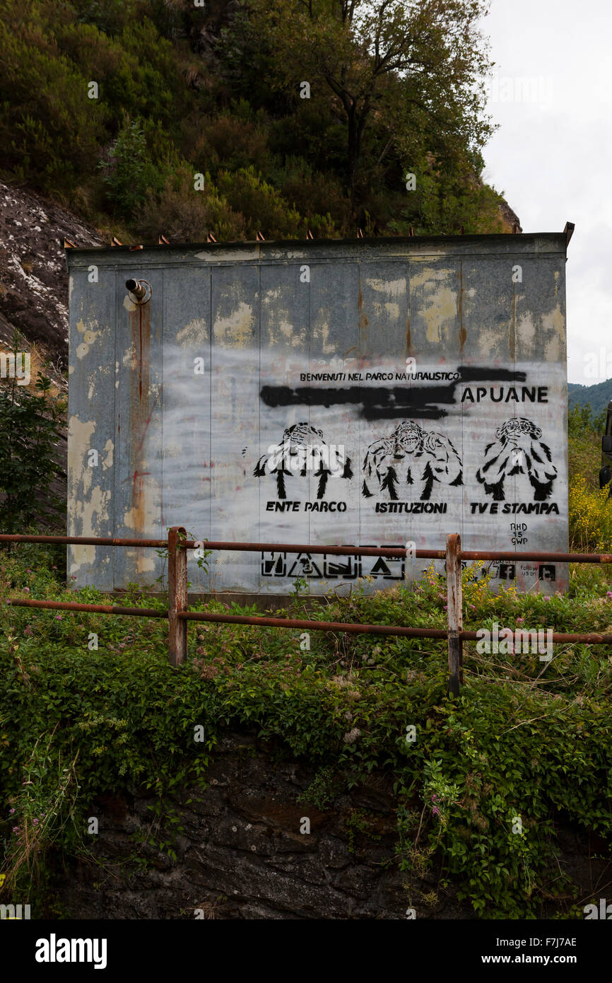 Local politicaL graffiti on an abandoned building, Via dei Colli road, Tuscany, Italy. Stock Photo