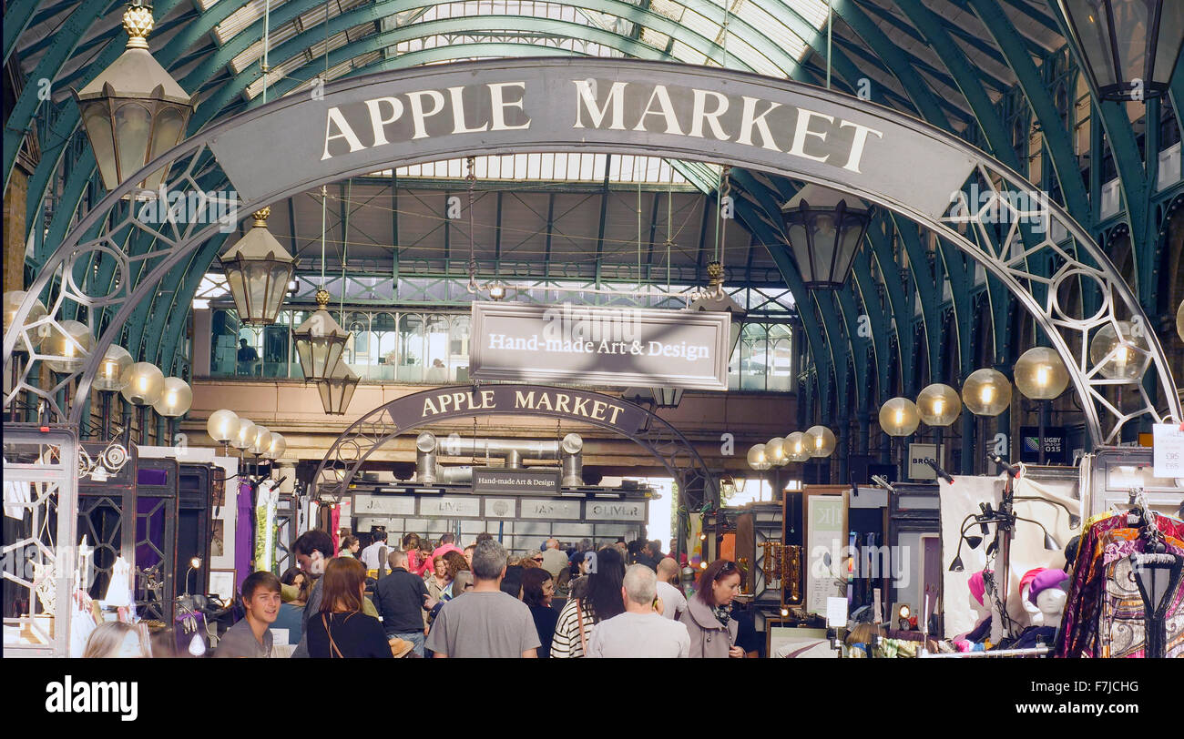 View of shoppers and stalls at Apple market , situated within Covent Garden Market, London UK. Stock Photo