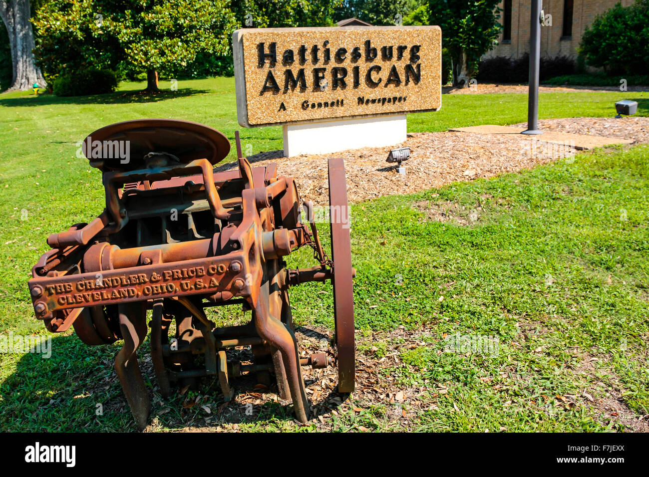 Old rusting manual printing press outside the Hattiesburg American