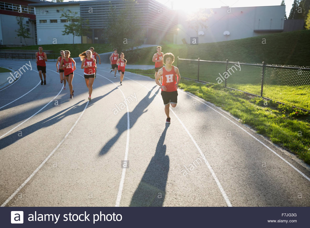 High school track and field athletes running track Stock Photo Alamy