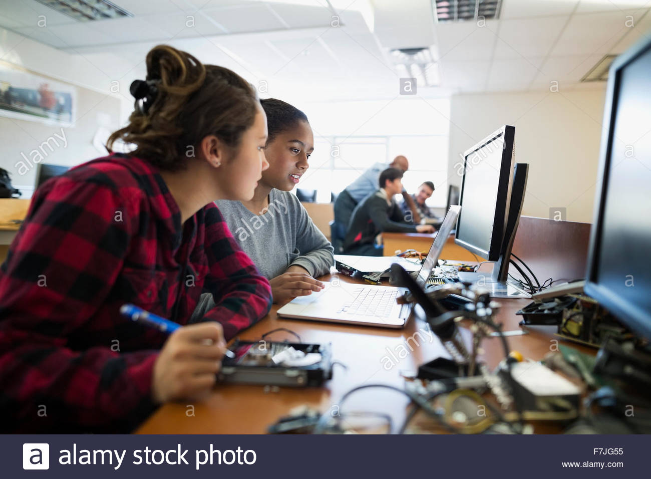 High school students with laptop computer science class Stock Photo
