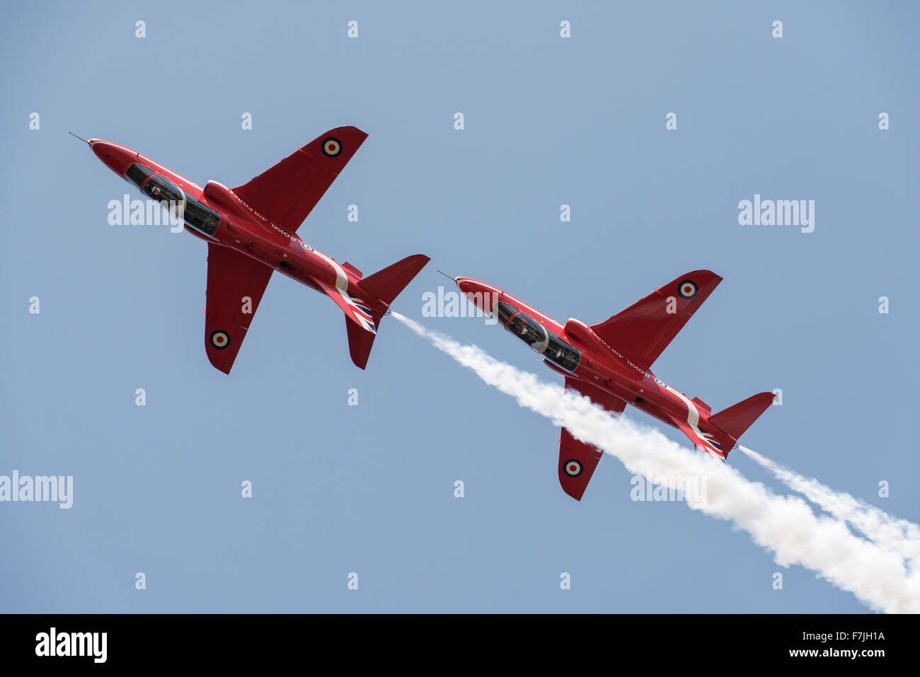 The RAF Red Arrows aerobatic display team's 'Synchro Pair' perform their exciting routine at the 2015 International Air Tattoo a Stock Photo
