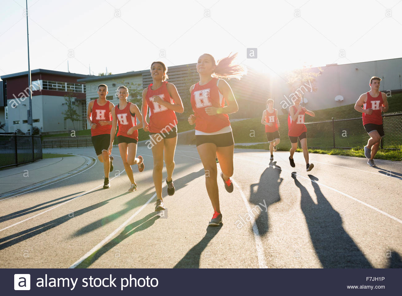 High school track and field athletes running track Stock Photo Alamy