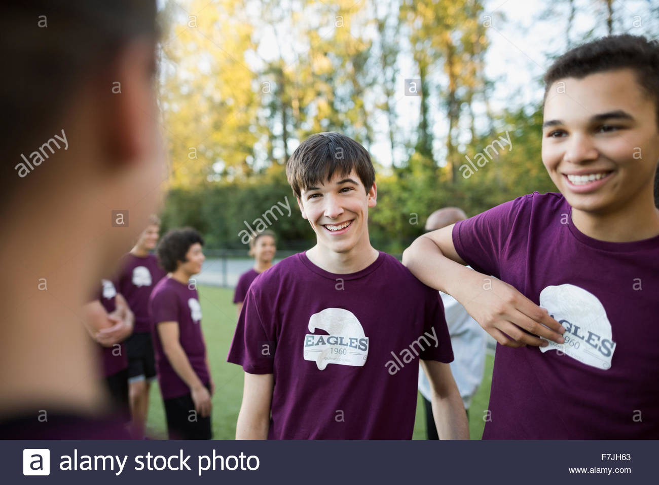 Boys talking school uniform hi-res stock photography and images - Alamy