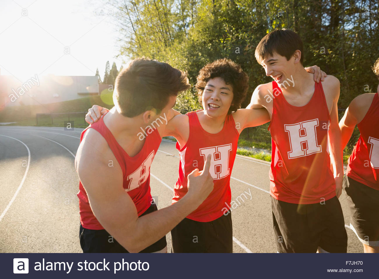 High school track and field athletes bonding Stock Photo Alamy