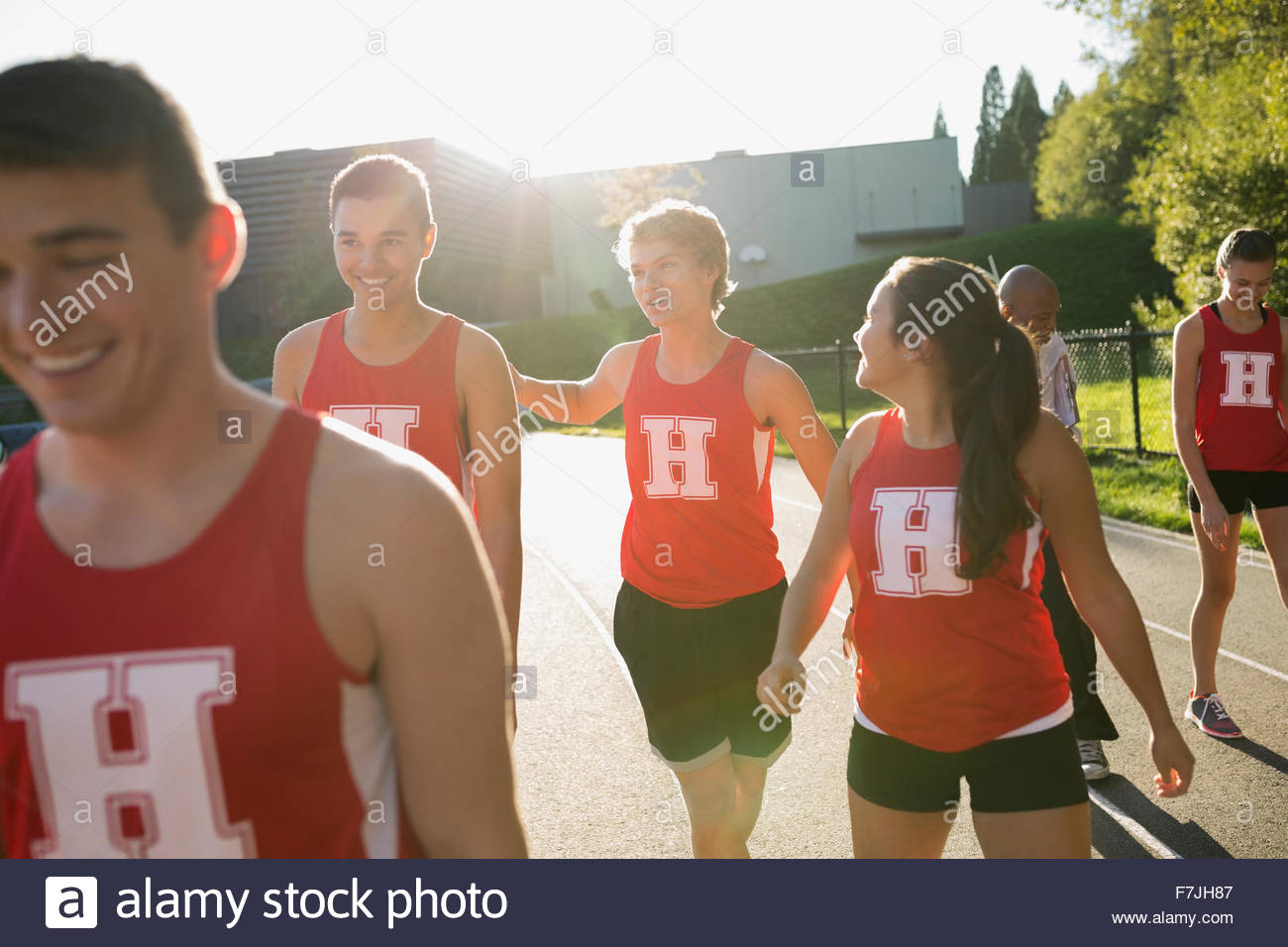 High school track and field team running track Stock Photo Alamy
