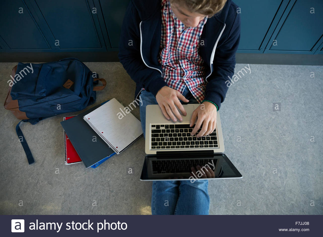 Overhead view high school student using laptop Stock Photo