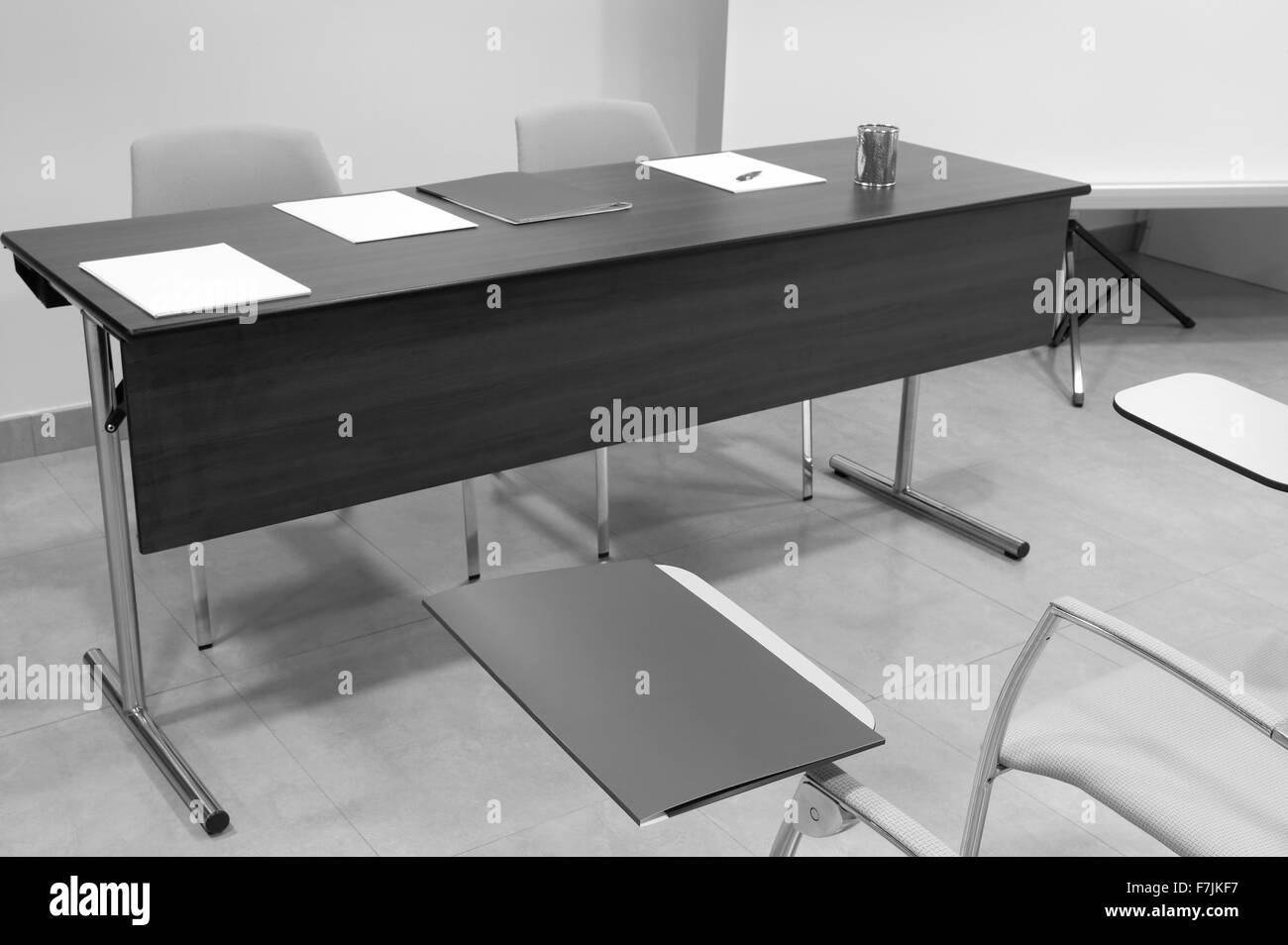 Classroom with desk and school chair black and white Stock Photo