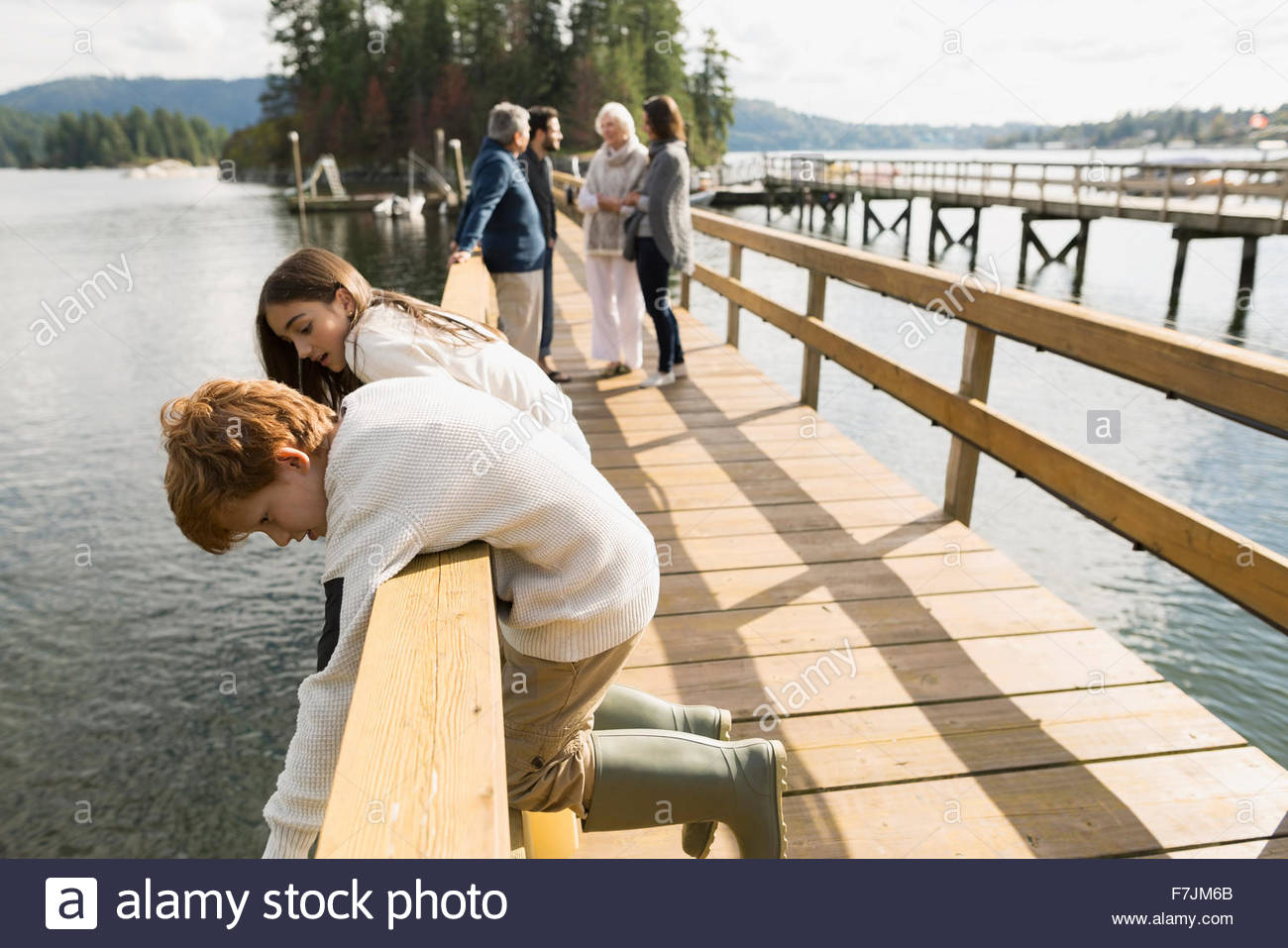 Boy Leaning Railing Outdoors High Resolution Stock Photography and ...