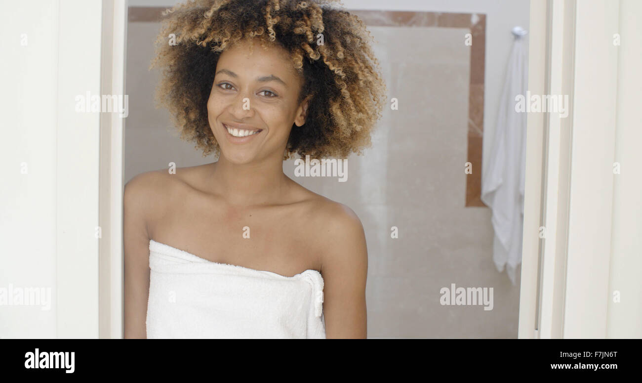 Smiling Young Woman In Towel Stock Photo - Alamy