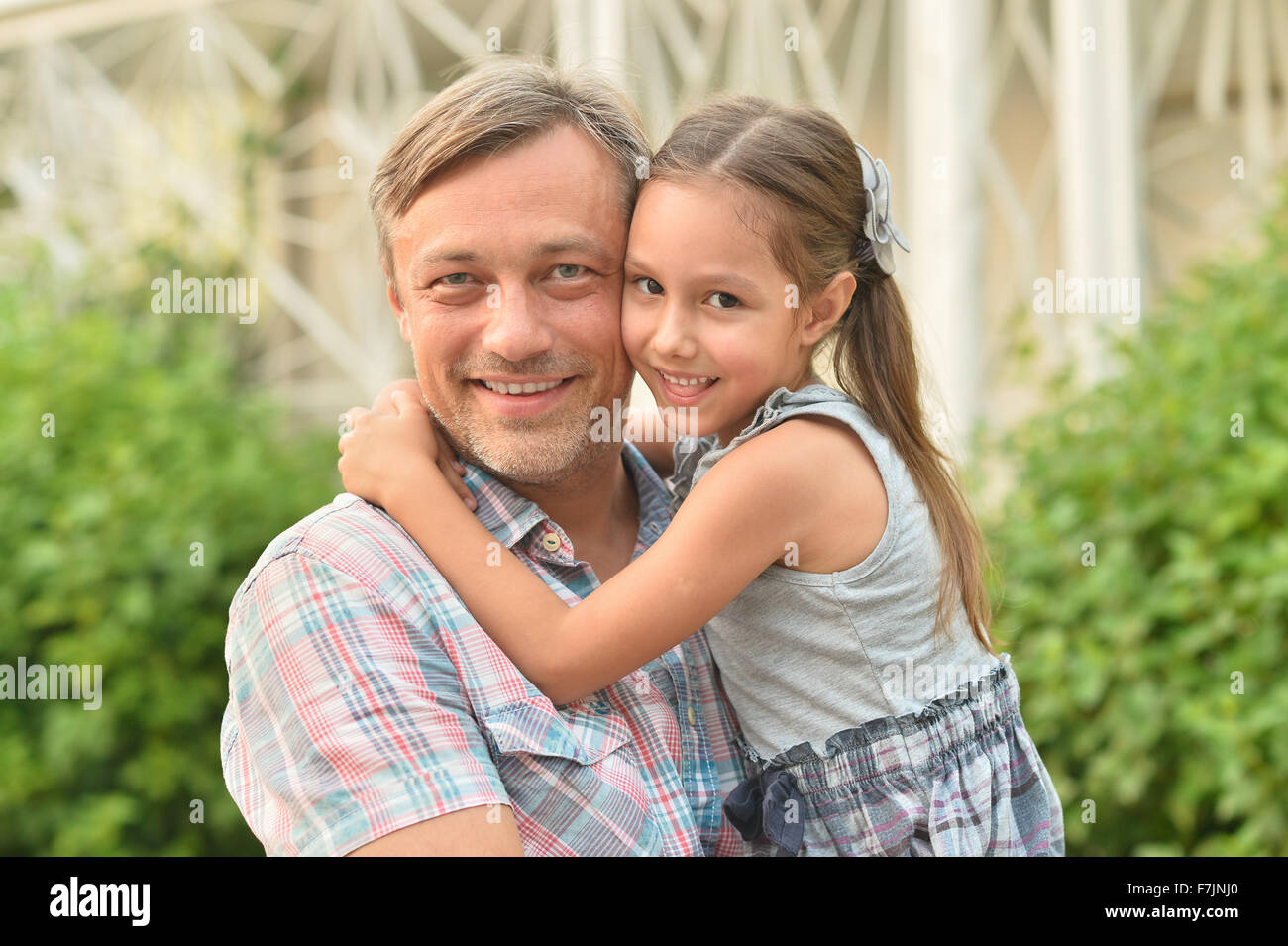 father with daughter in summer park Stock Photo - Alamy