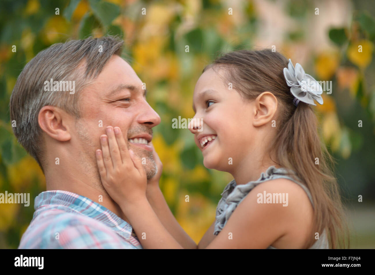 father with daughter in summer park Stock Photo - Alamy