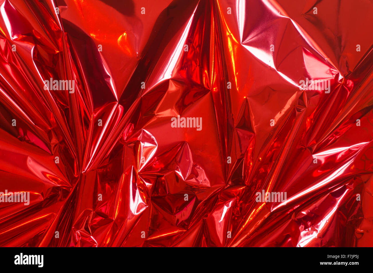 red shiny metallic foil background Stock Photo