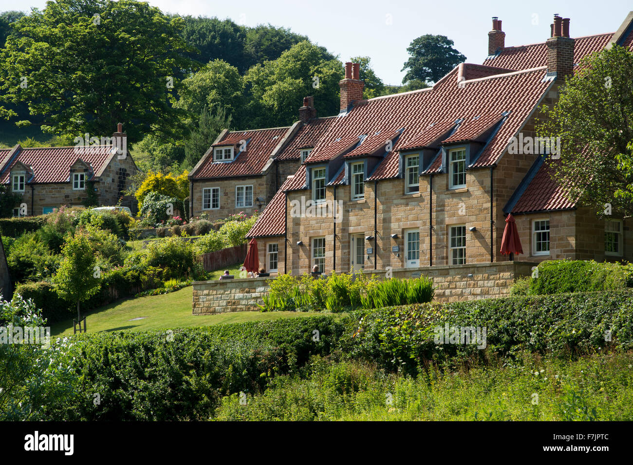 Row Of Traditional Quaint Cottages With Pantiles In The