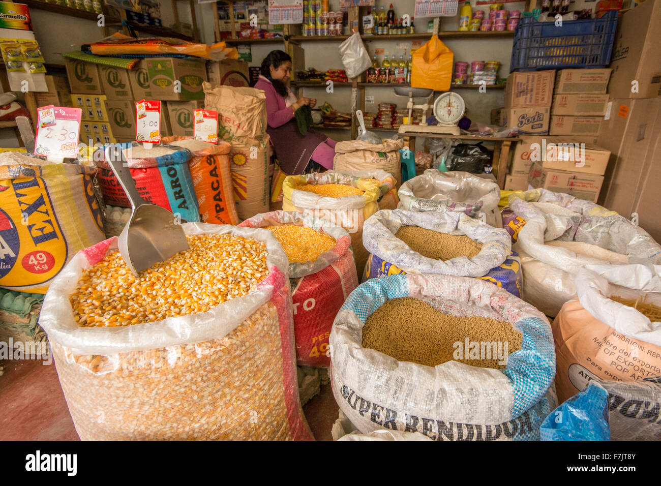 Shop selling various types of corn and grain in town of Cajabamba in Cajamarca region of Peru Stock Photo