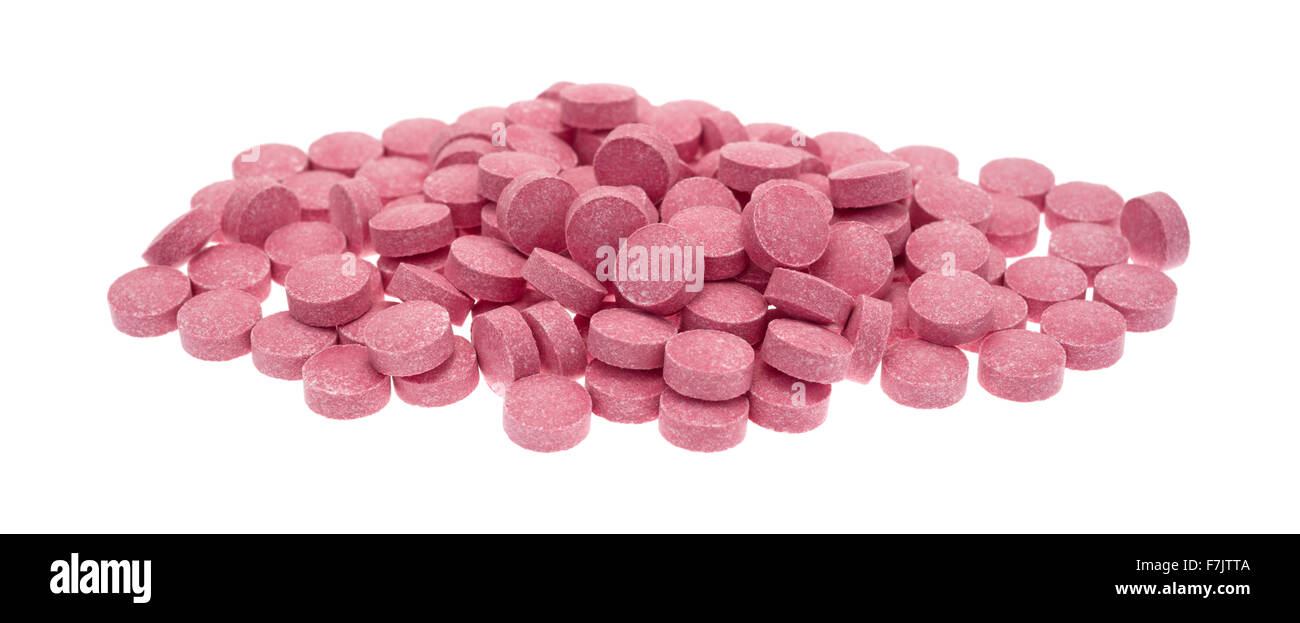 A large portion of vitamin B12 tablets isolated on a white background. Stock Photo